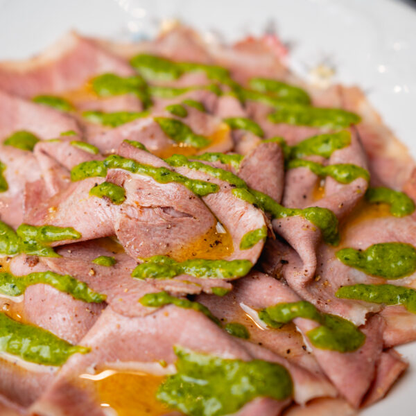 Beef tongue in green sauce