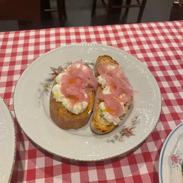 Goat cheese, red onion from Milan, and pepper with crostini bread
