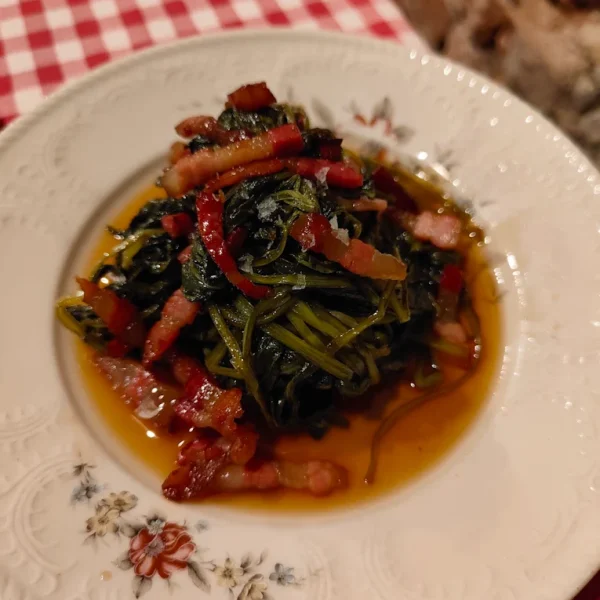 Dandelion sautéed with bacon and balsamic vinegar